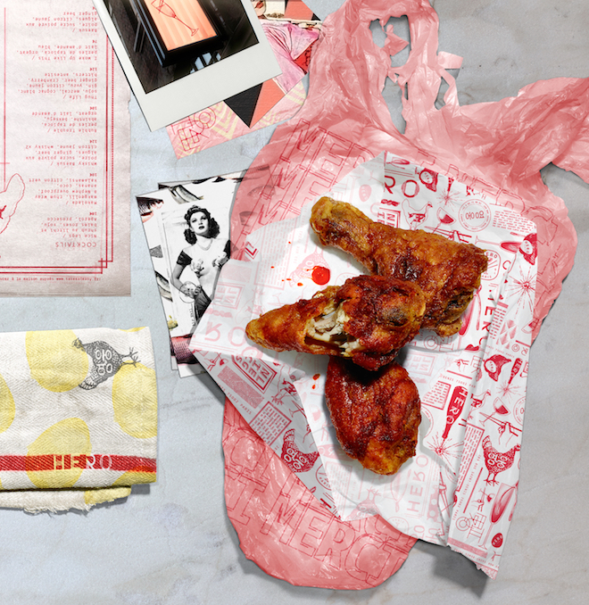 Korean chicken fries on a champagne colored paper food wrappers
