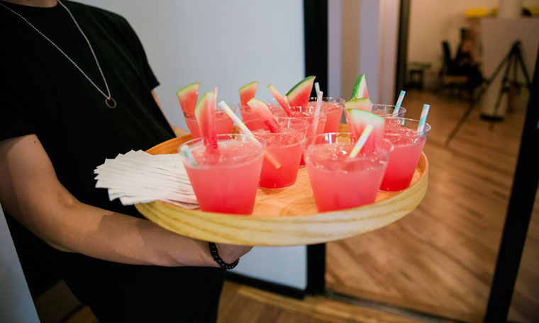 Fruity iced cocktails topped with a slice of watermelon were served at The Klog launch party
